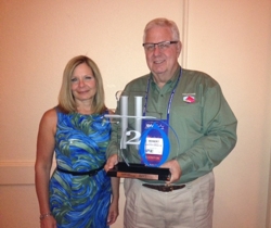 Robert J. Ferguson and Janet J. Ferguson accept the AWT Supplier of the Year Award